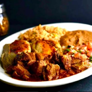 37. 2 Tamales, Asado, Spanish Rice, Refried Beans and Pico De Gallo
