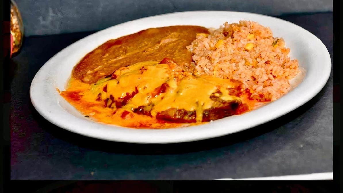 46. 1 Cheese Chile Relleno, Spanish Rice and Refried Beans.