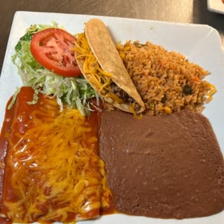 31. 1 Crispy Beef Taco, 2 Enchiladas, Spanish Rice and Refried Beans